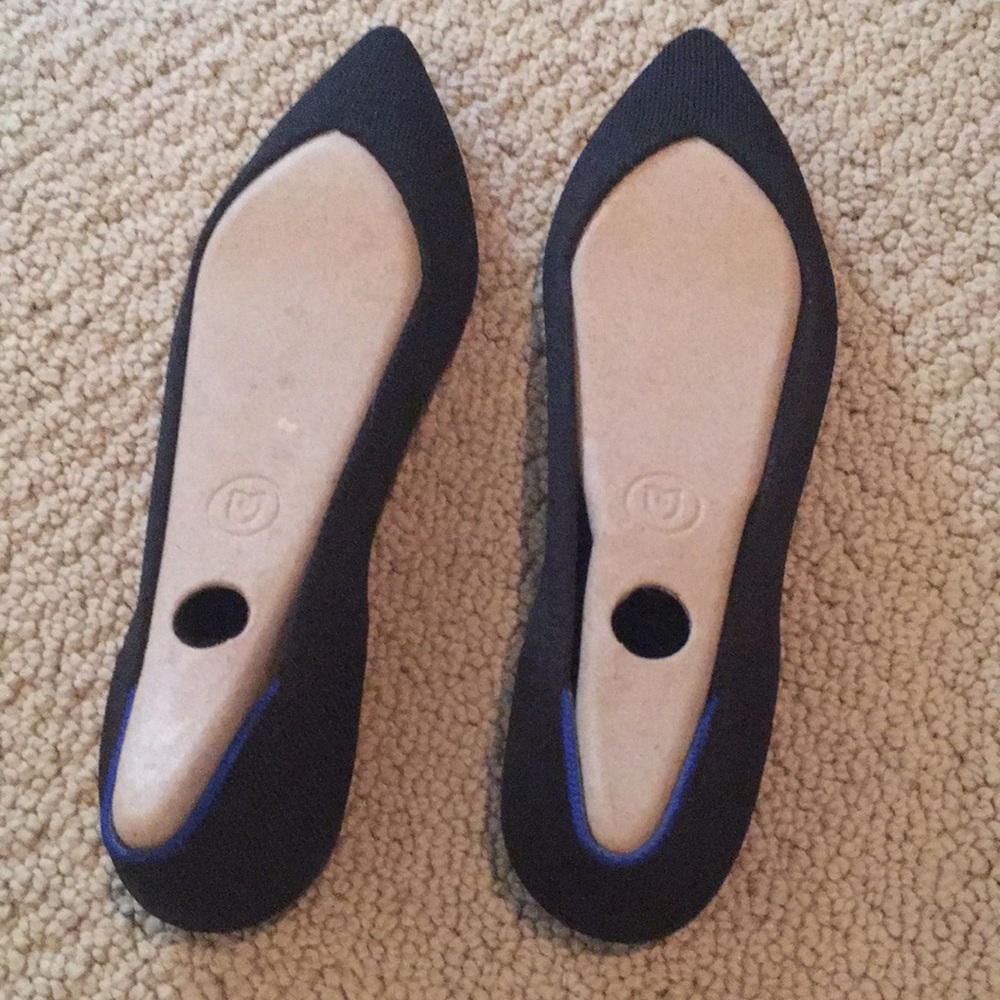 Rothy’s Black pointed toe shoes. Size W8